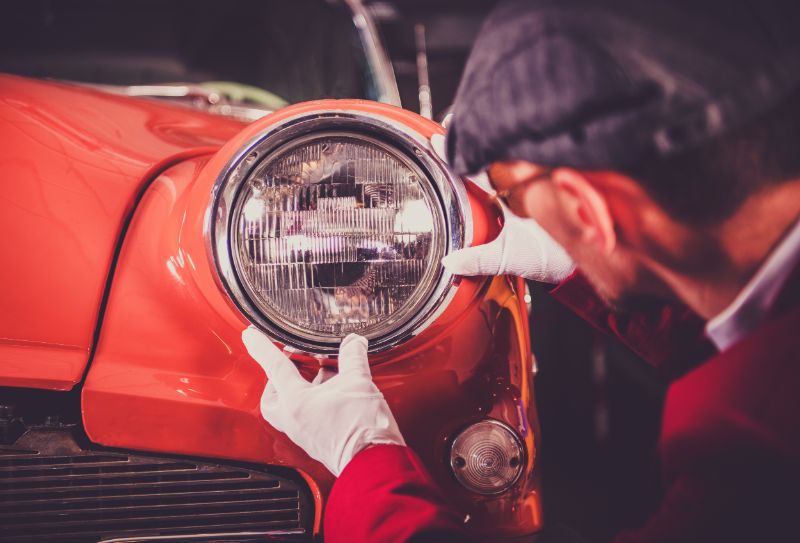 A man restoring Vintage Car